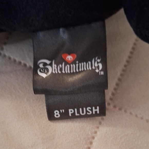 Black and White Plush Bunny with Heart - Picture 2 of 3